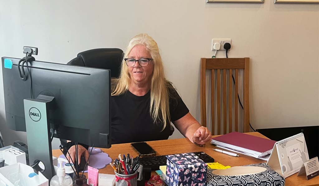 An employee in Sterry Funeral Service's Hythe branch, ready to help you.
